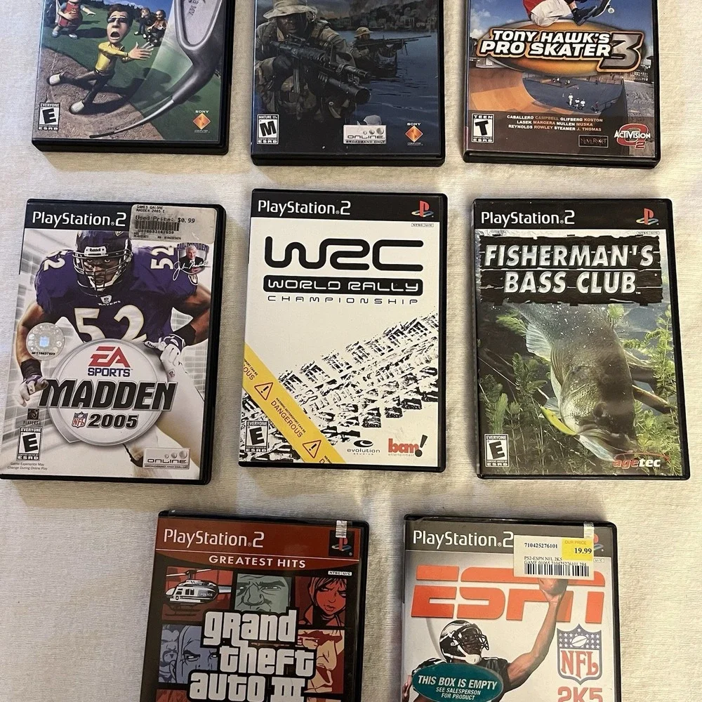 PlayStation 2 Assorted Game Bundle Call of Duty 2, SOCOM, 8 Games in Total